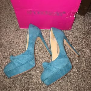 Turquoise high heeled shoes